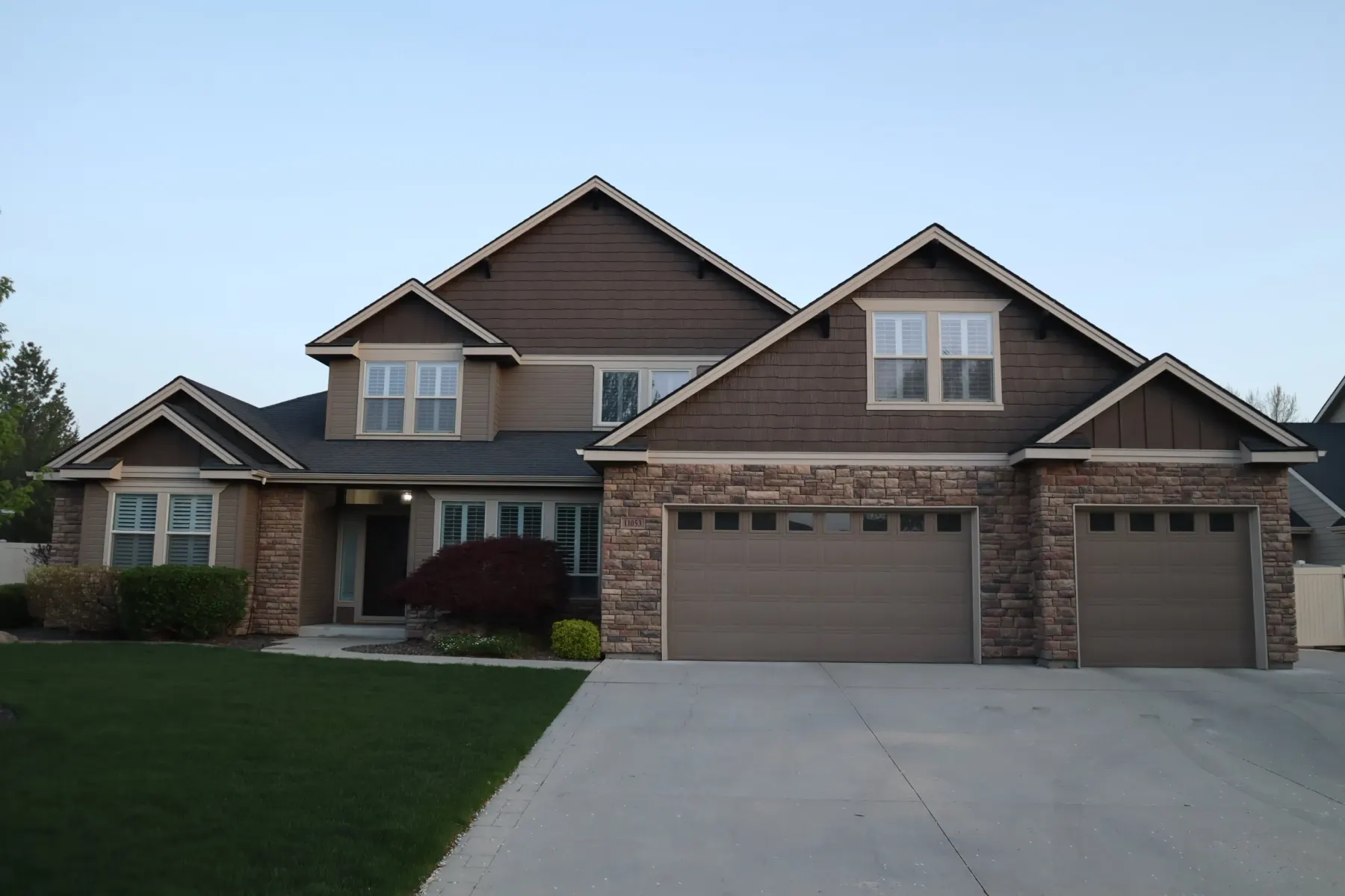 Two-storey home in daylight, the kind of straight-on photo that works best in the light visualizer